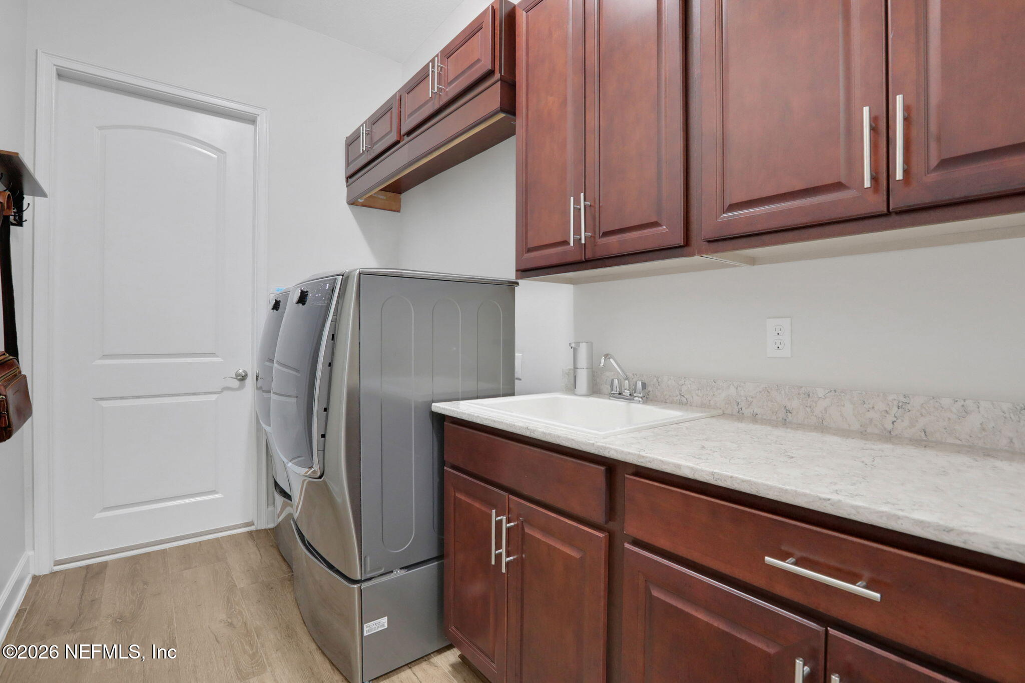 4460 Barkoskie Road Jacksonville, FL 32258 - Photo 45 of 80 a kitchen with stainless steel appliances granite countertop a refrigerator and a cabinets
