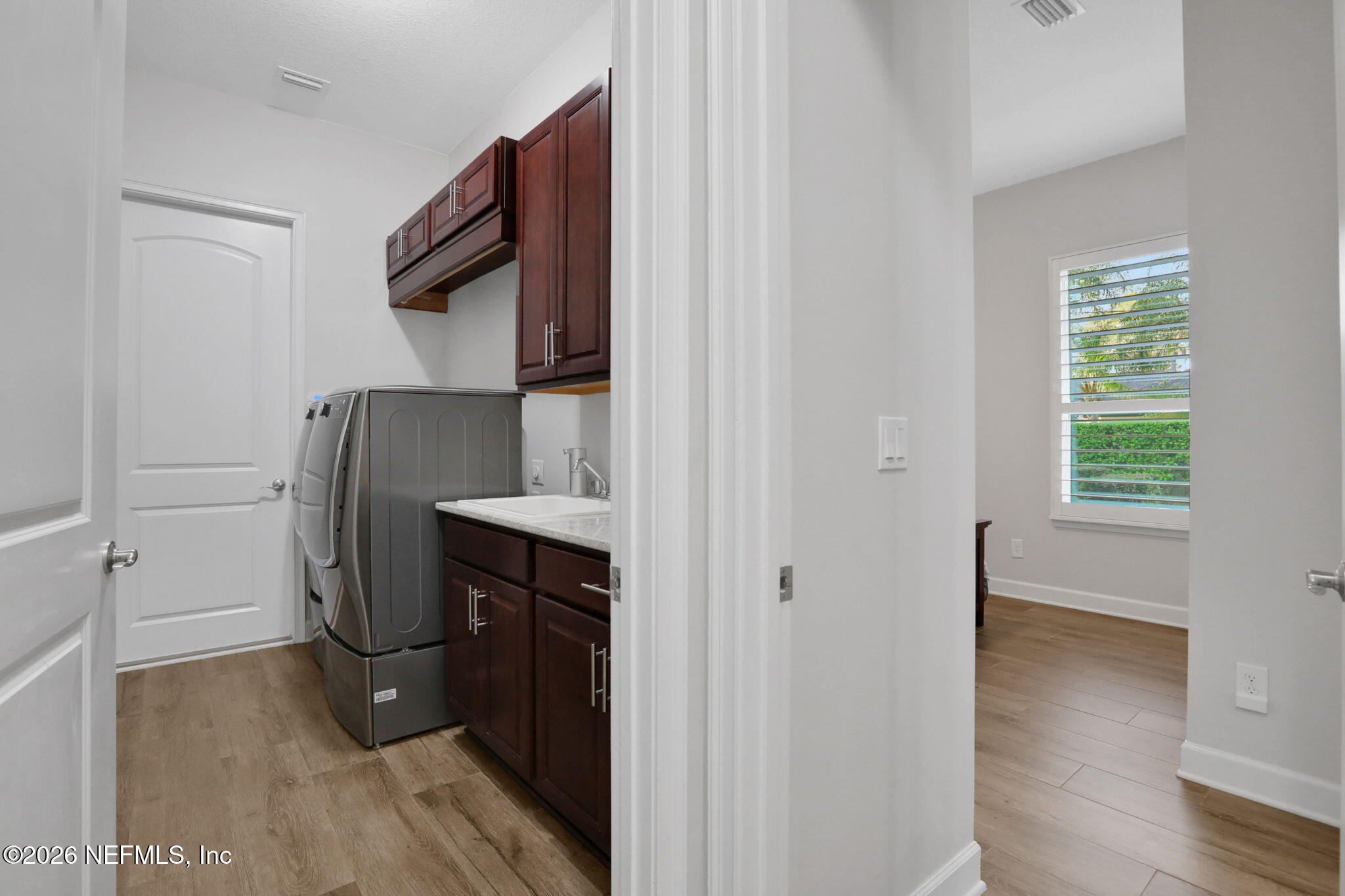 4460 Barkoskie Road Jacksonville, FL 32258 - Photo 46 of 80 a view of walk in closet with clothes and shoes