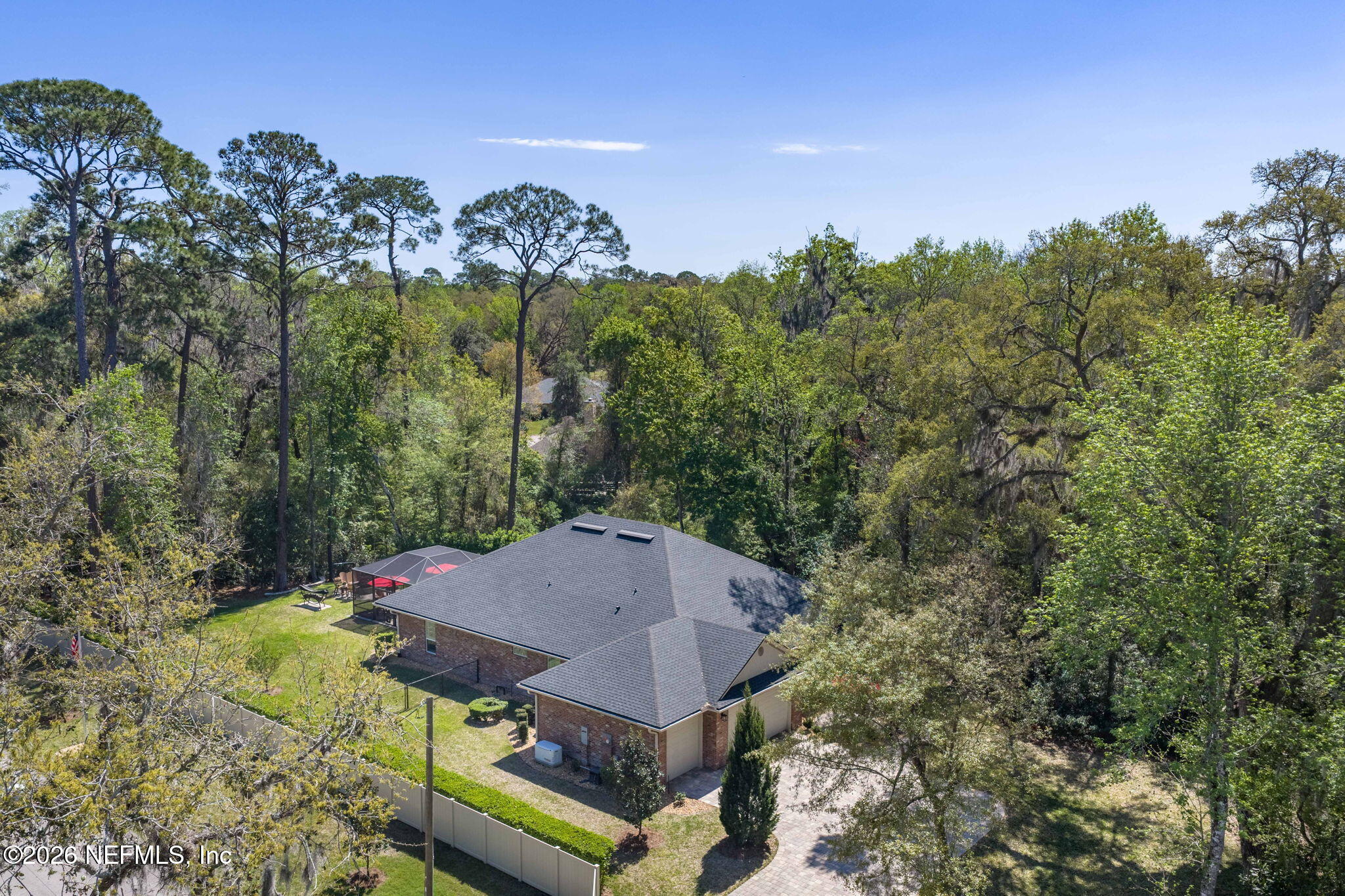 4460 Barkoskie Road Jacksonville, FL 32258 - Photo 66 of 80 an aerial view of a house with a garden