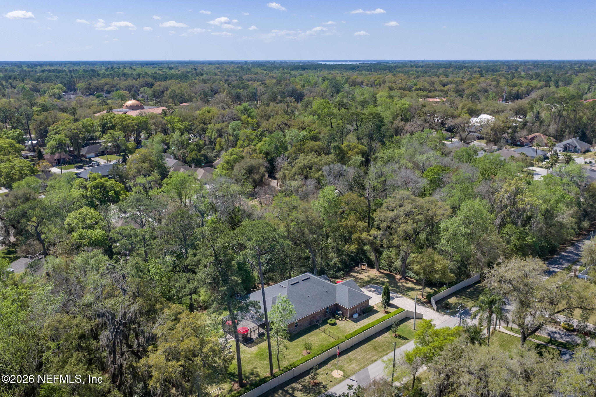 4460 Barkoskie Road Jacksonville, FL 32258 - Photo 69 of 80 an aerial view of house with yard and mountain view in back
