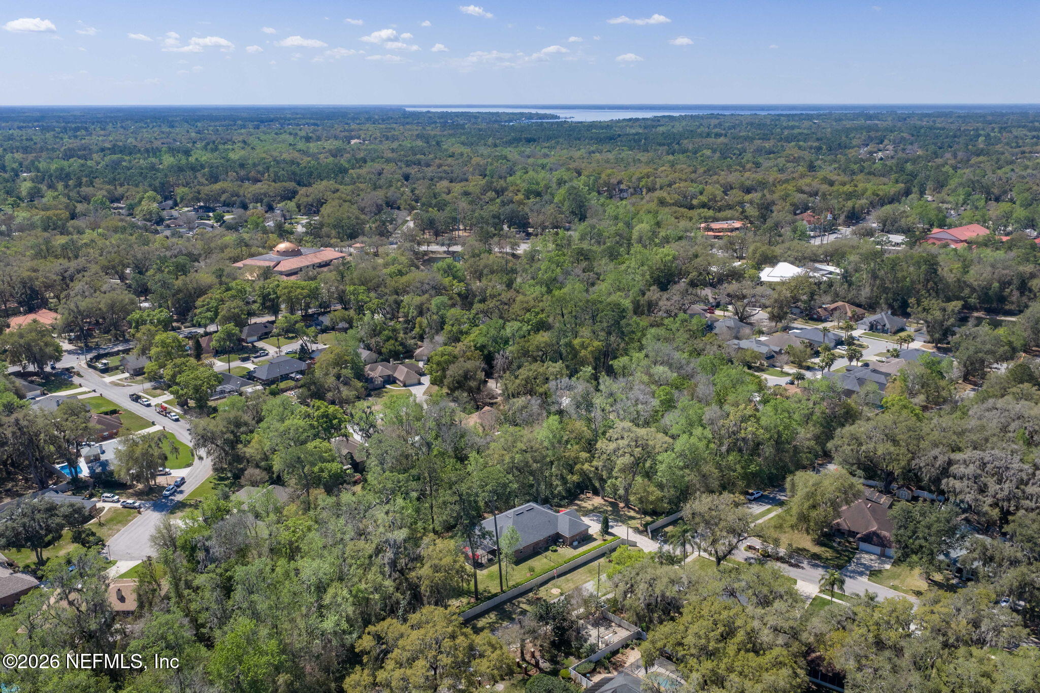 4460 Barkoskie Road Jacksonville, FL 32258 - Photo 70 of 80 an aerial view of house with yard and mountain view in back