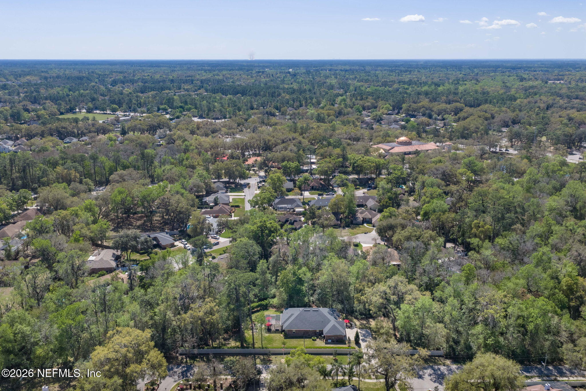 4460 Barkoskie Road Jacksonville, FL 32258 - Photo 71 of 80 an aerial view of residential houses with outdoor space and trees