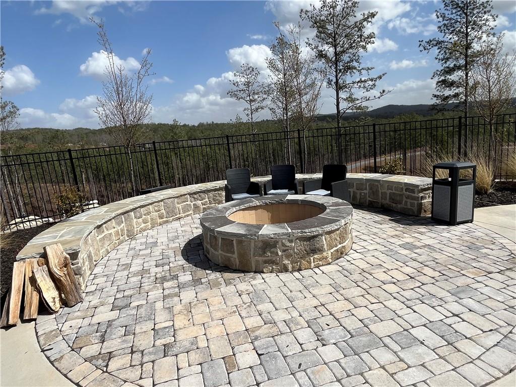 123 Blalock Mountain Road Talking Rock, GA 30175 - Photo 32 of 35 a view of a backyard with furniture