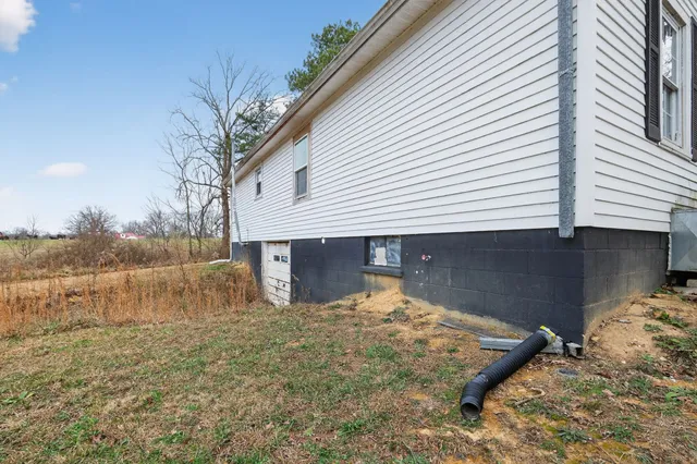 a view of a backyard with a garden