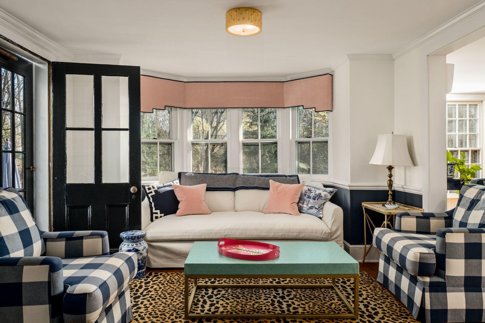 1122 Smith Ridge Road New Canaan, CT 06840 - Photo 5 of 25 a living room with furniture and a large window