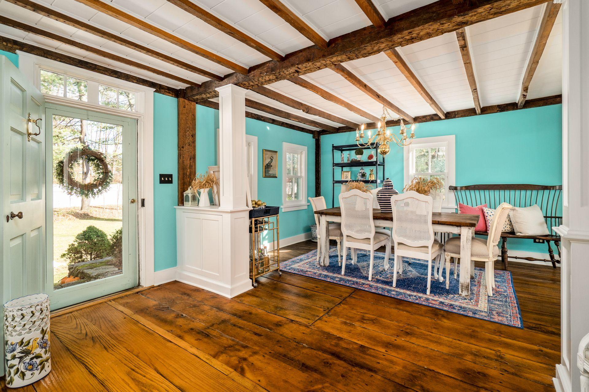 1122 Smith Ridge Road New Canaan, CT 06840 - Photo 10 of 25 a view of a dining room with furniture window and wooden floor
