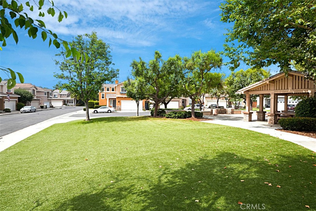 56 Acorn Ridge Rancho Santa Margarita, CA 92688 - Photo 47 of 57 Community Green Space: Open lawn area with mature shade trees and a covered pavilion for outdoor use.