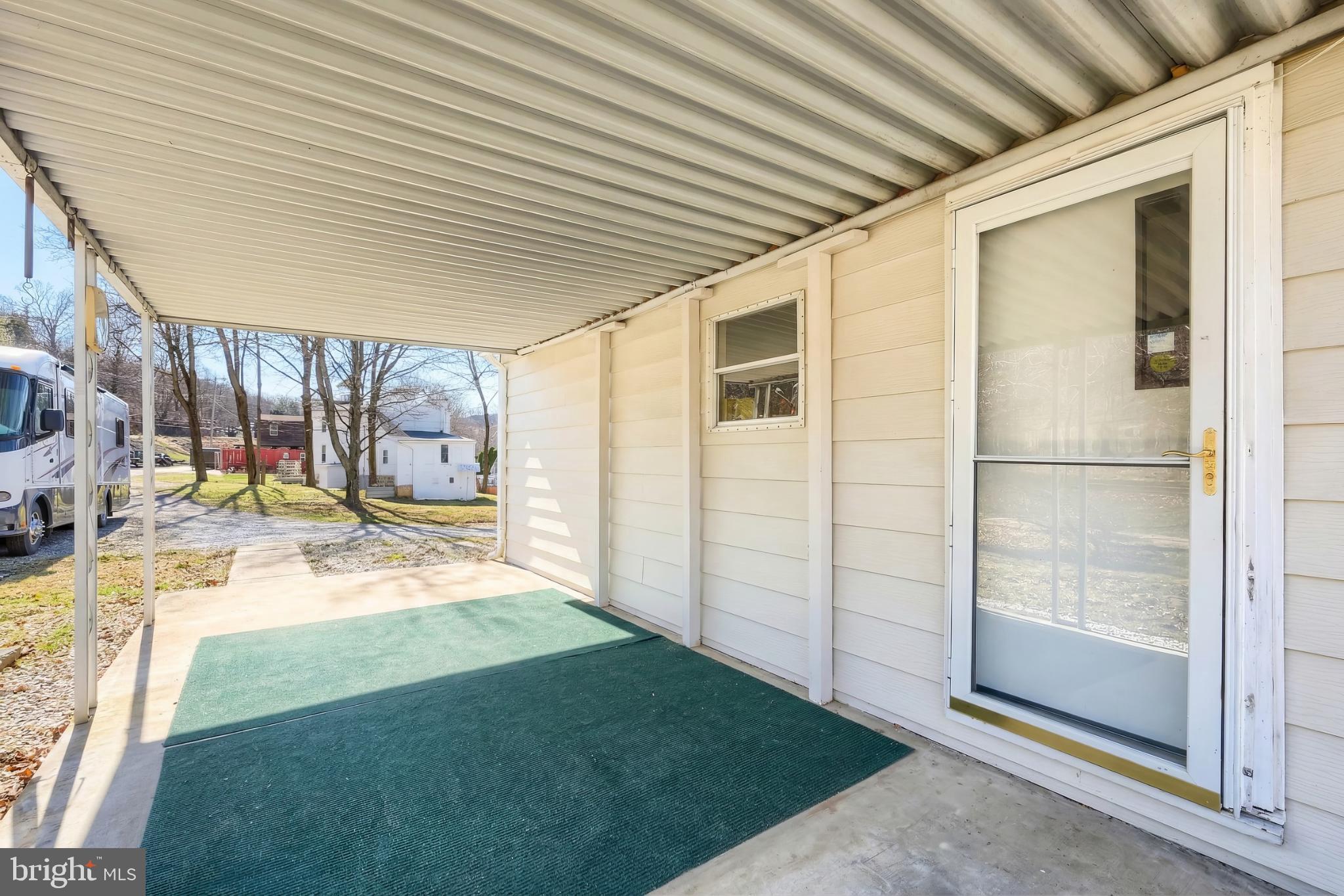101 Tri Hill Road York, PA 17403 - Photo 11 of 34 Welcoming entryway with covered porch charm.