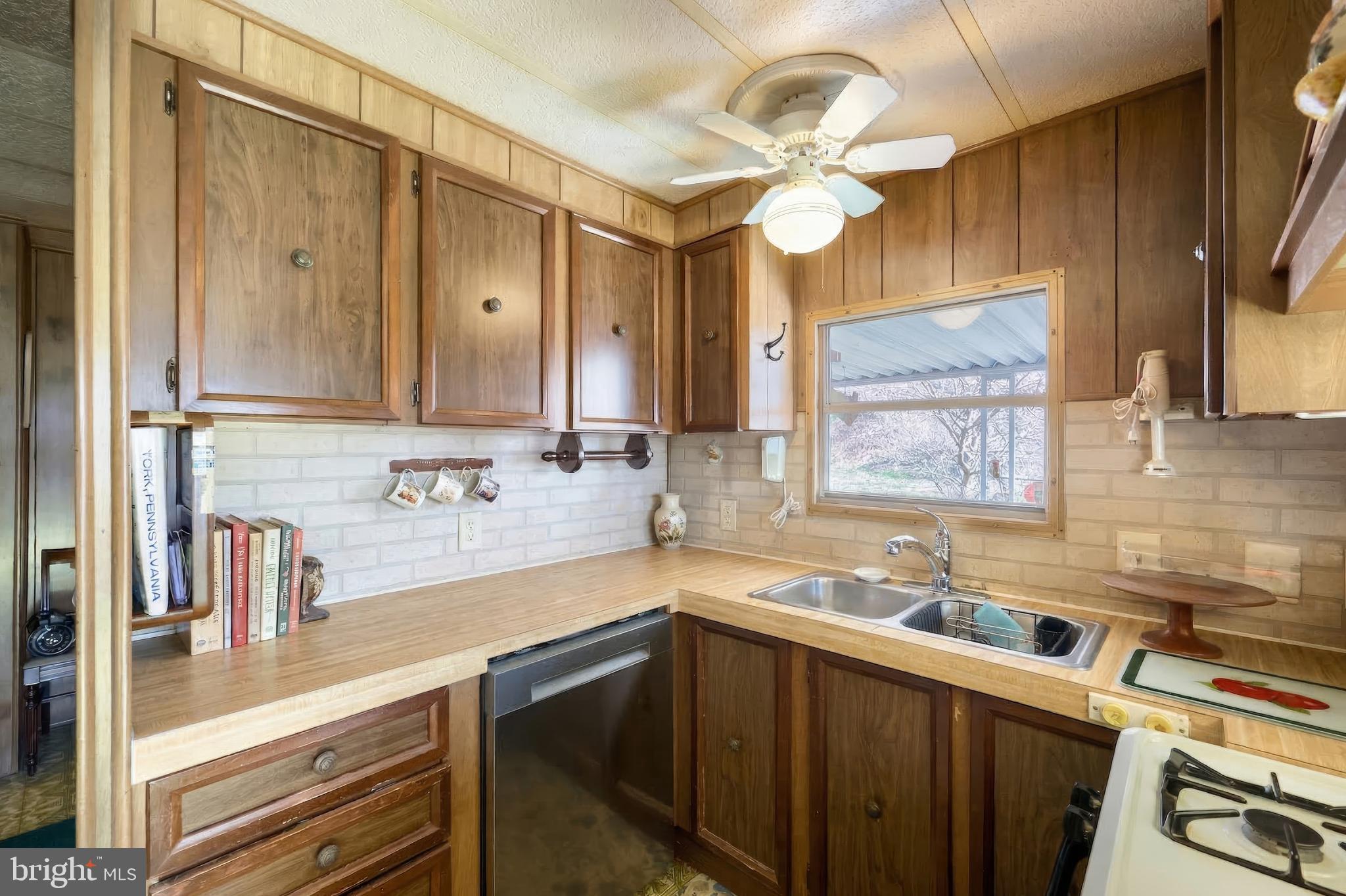 101 Tri Hill Road York, PA 17403 - Photo 14 of 34 Cozy kitchen with warm wooden accents.