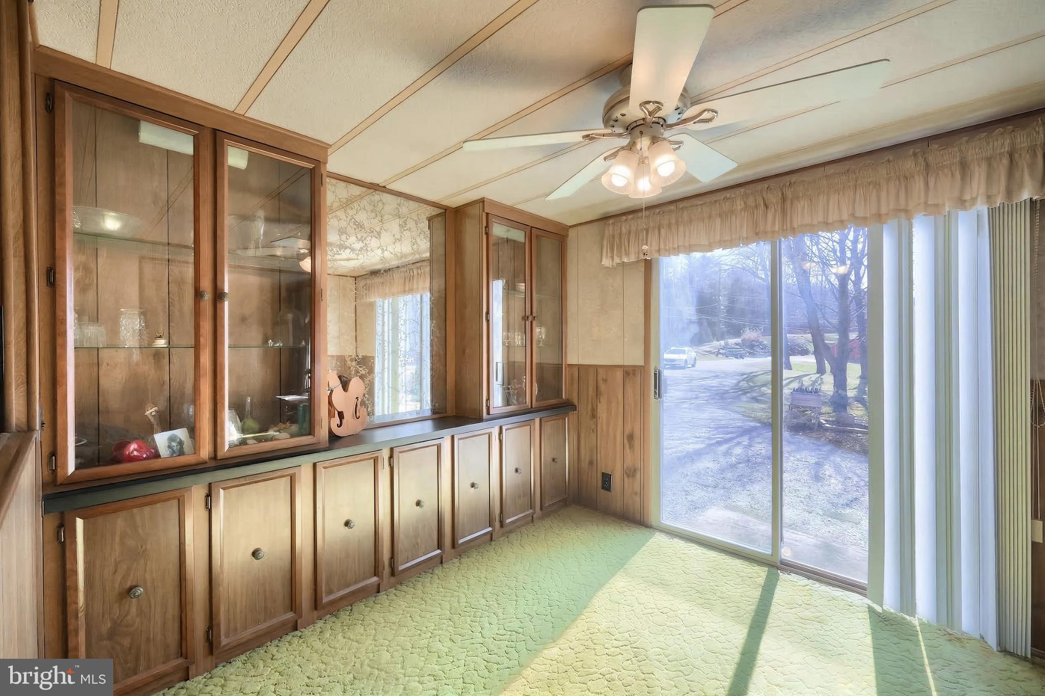 101 Tri Hill Road York, PA 17403 - Photo 15 of 34 Sunlit room with vintage charm and greenery.