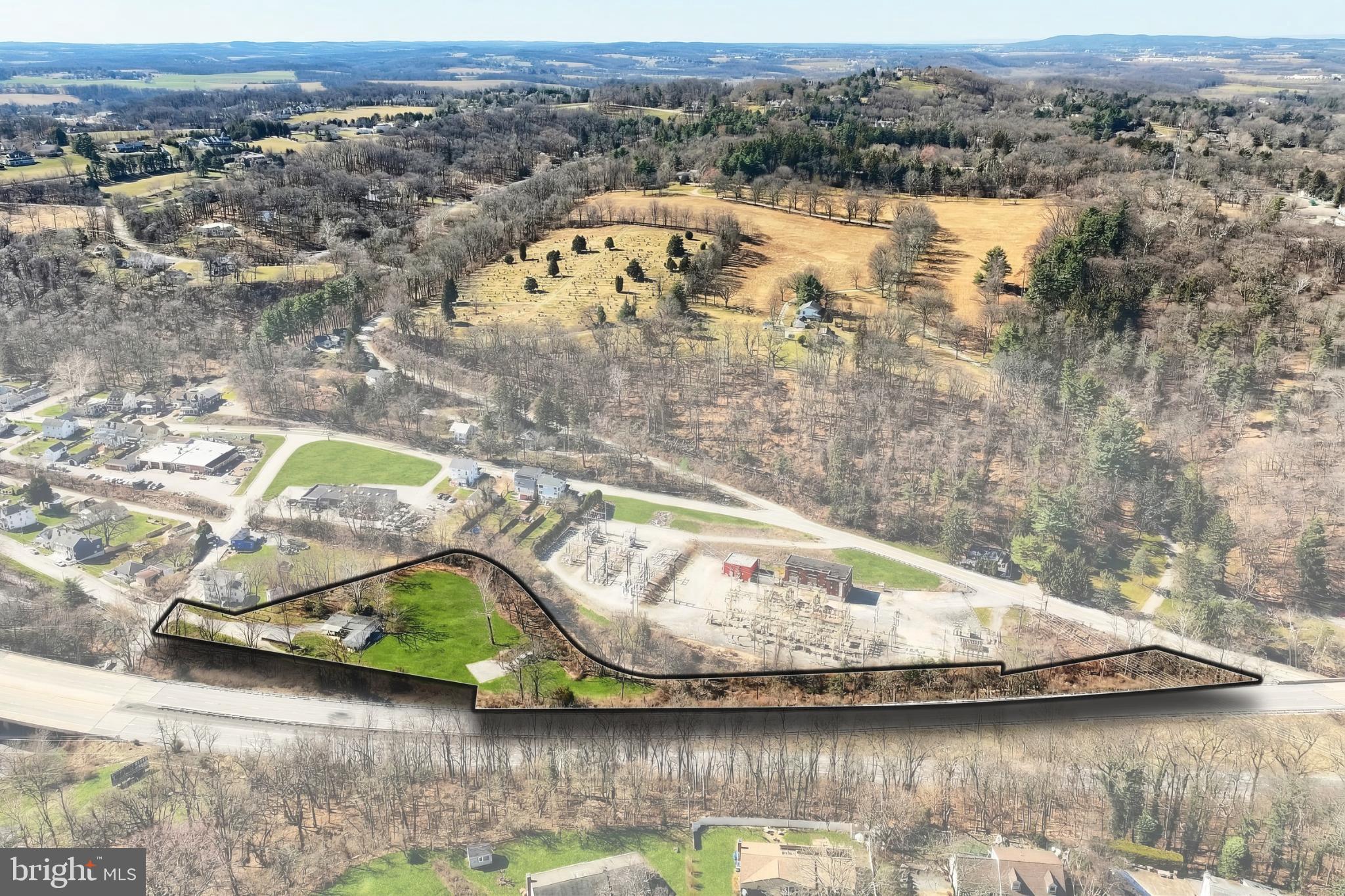101 Tri Hill Road York, PA 17403 - Photo 23 of 34 Scenic land with winding road and greenery.