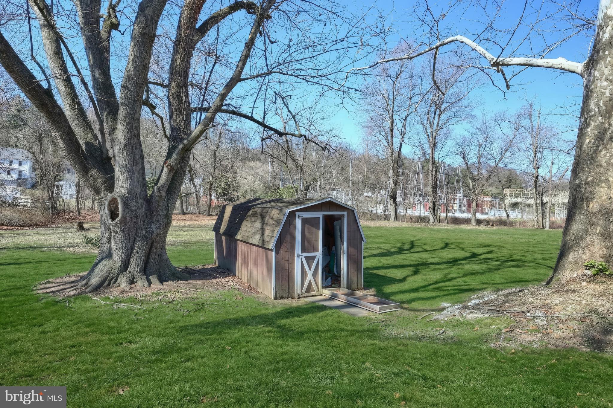 101 Tri Hill Road York, PA 17403 - Photo 9 of 34 Charming shed nestled in a serene landscape.
