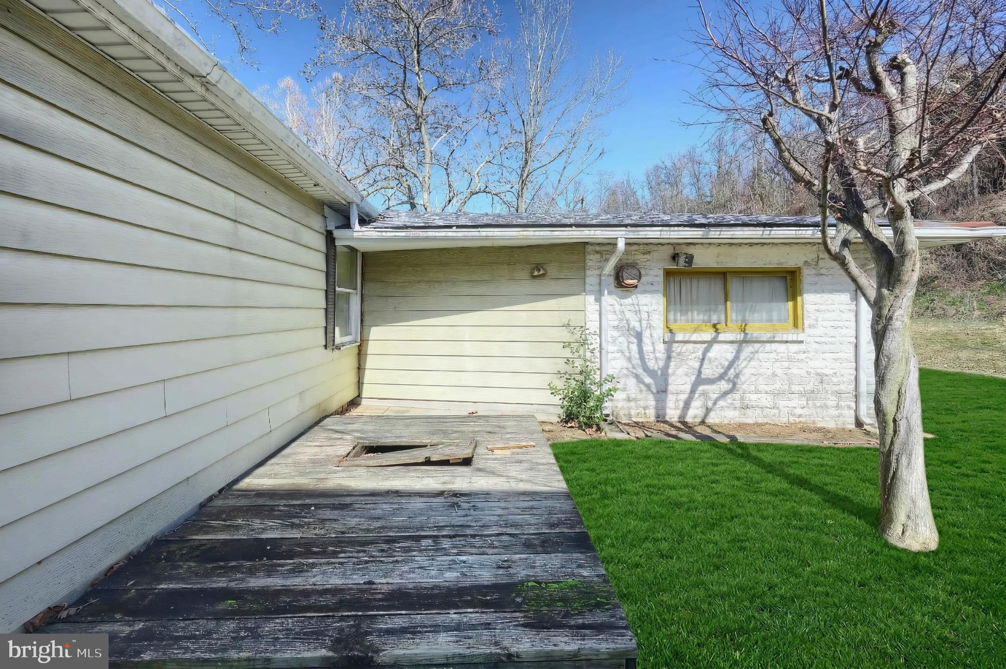 101 Tri Hill Road York, PA 17403 - Photo 10 of 34 Charming exterior with lush green surroundings.