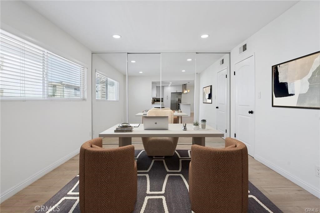 5330 Zelzah Avenue, Unit 7 Encino, CA 91316 - Photo 16 of 35 a dining room with furniture and window