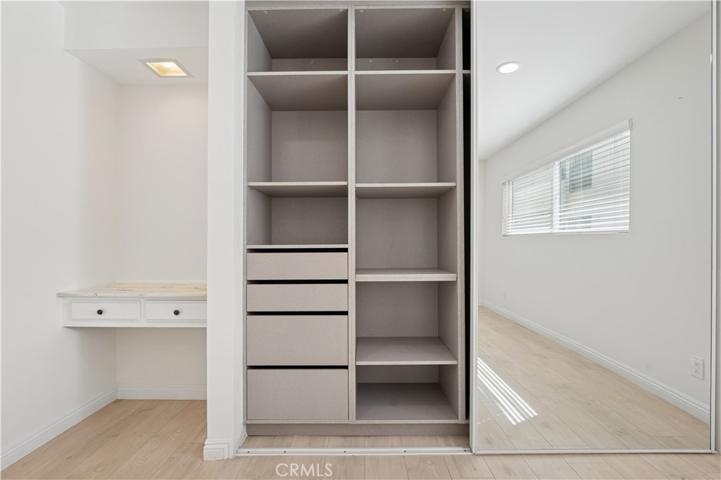 5330 Zelzah Avenue, Unit 7 Encino, CA 91316 - Photo 21 of 35 a view of an empty walk in closet