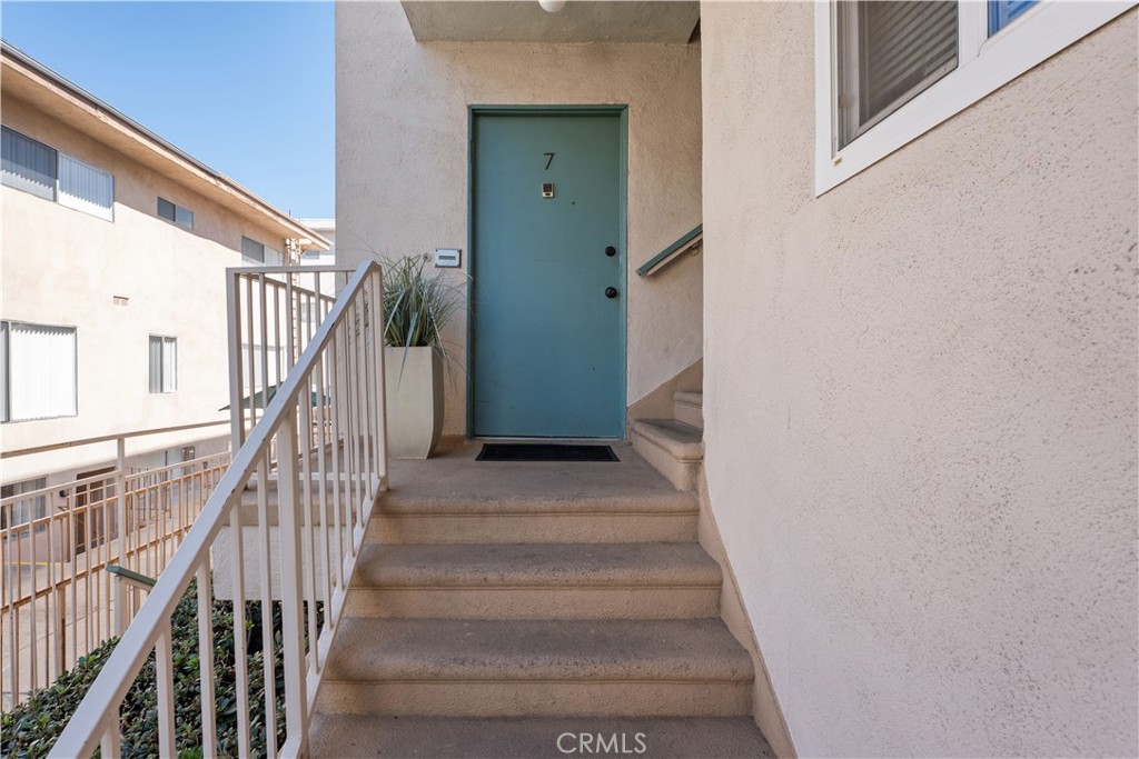 5330 Zelzah Avenue, Unit 7 Encino, CA 91316 - Photo 29 of 35 a view of staircase with wooden floor and stairs