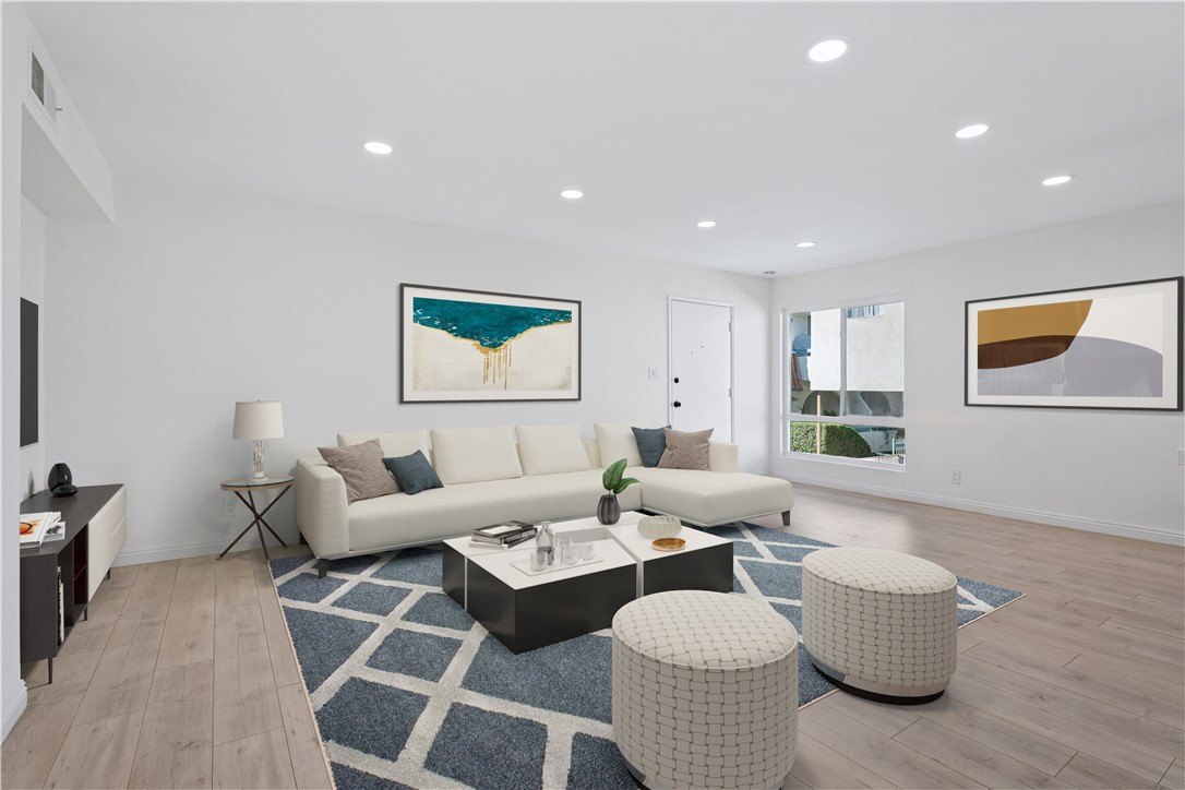 5330 Zelzah Avenue, Unit 7 Encino, CA 91316 - Photo 4 of 35 a living room with furniture and wooden floor