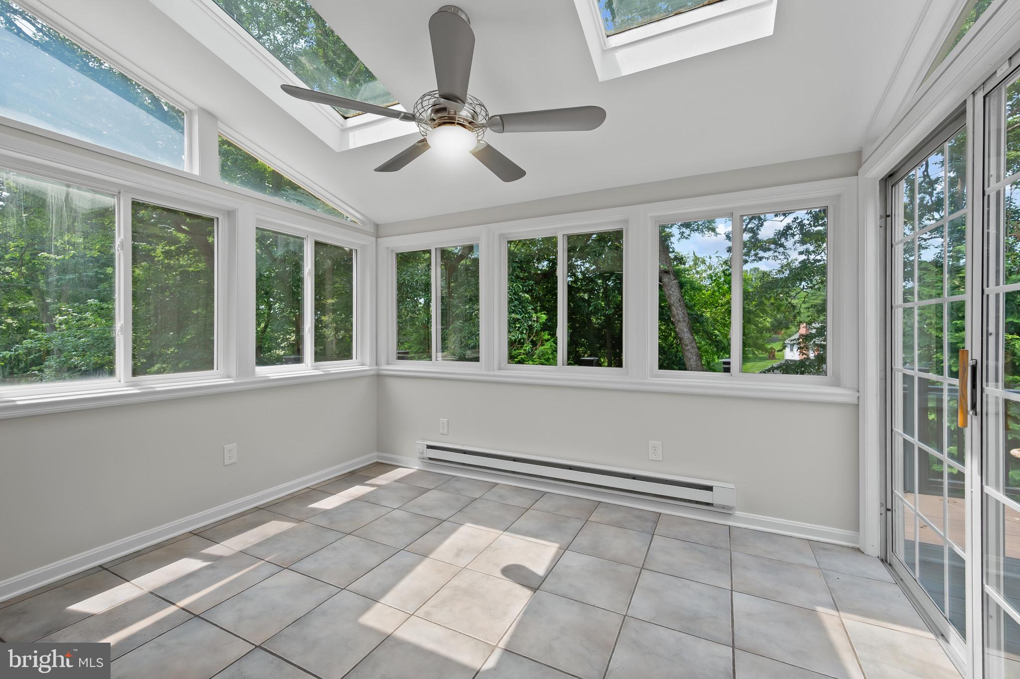 15016 Wellwood Road Silver Spring, MD 20905 - Photo 12 of 52 a view of an empty room with a window