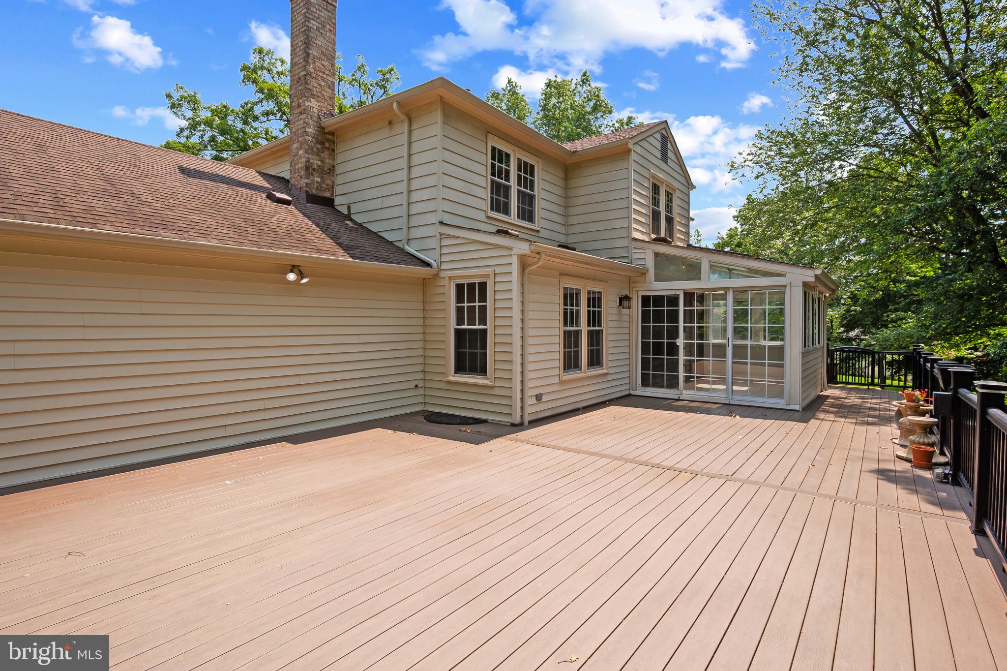 15016 Wellwood Road Silver Spring, MD 20905 - Photo 19 of 52 a view of a house with a yard