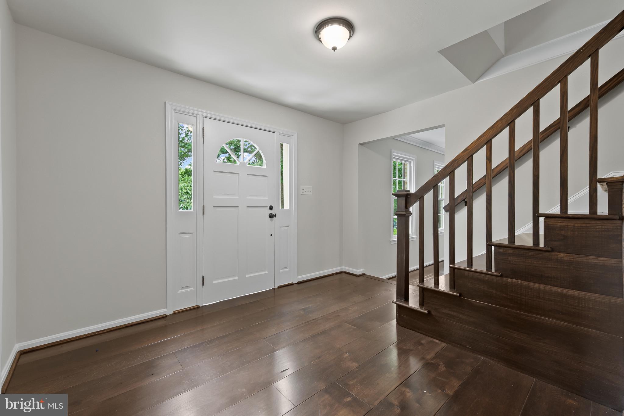 15016 Wellwood Road Silver Spring, MD 20905 - Photo 4 of 52 wooden floor with an entryway