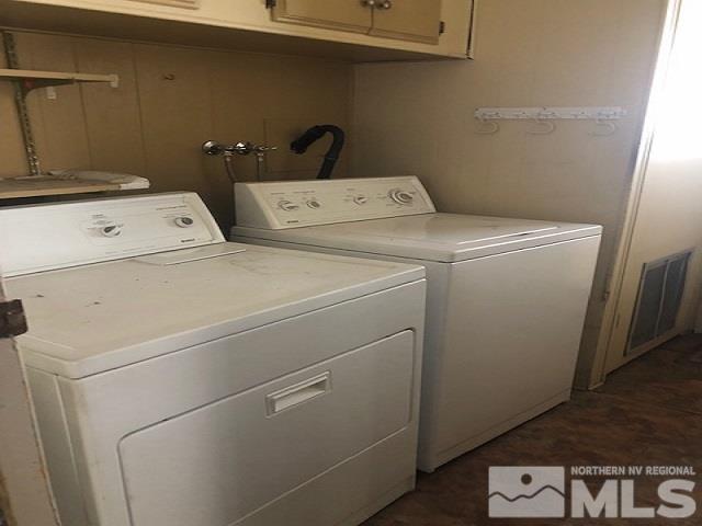 490 Capricorn Circle Reno, NV 89521 - Photo 12 of 26 a utility room with dryer and washer