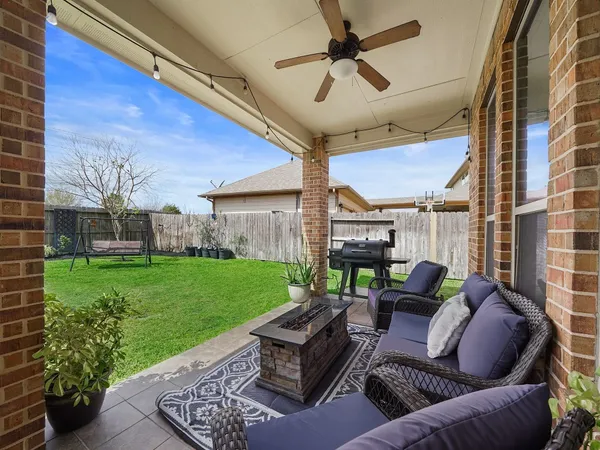 a outdoor living space with furniture and garden