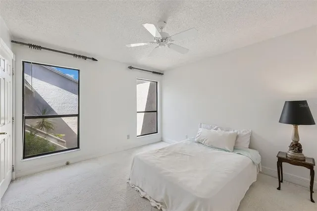 a bathroom with a sink toilet tub and shower