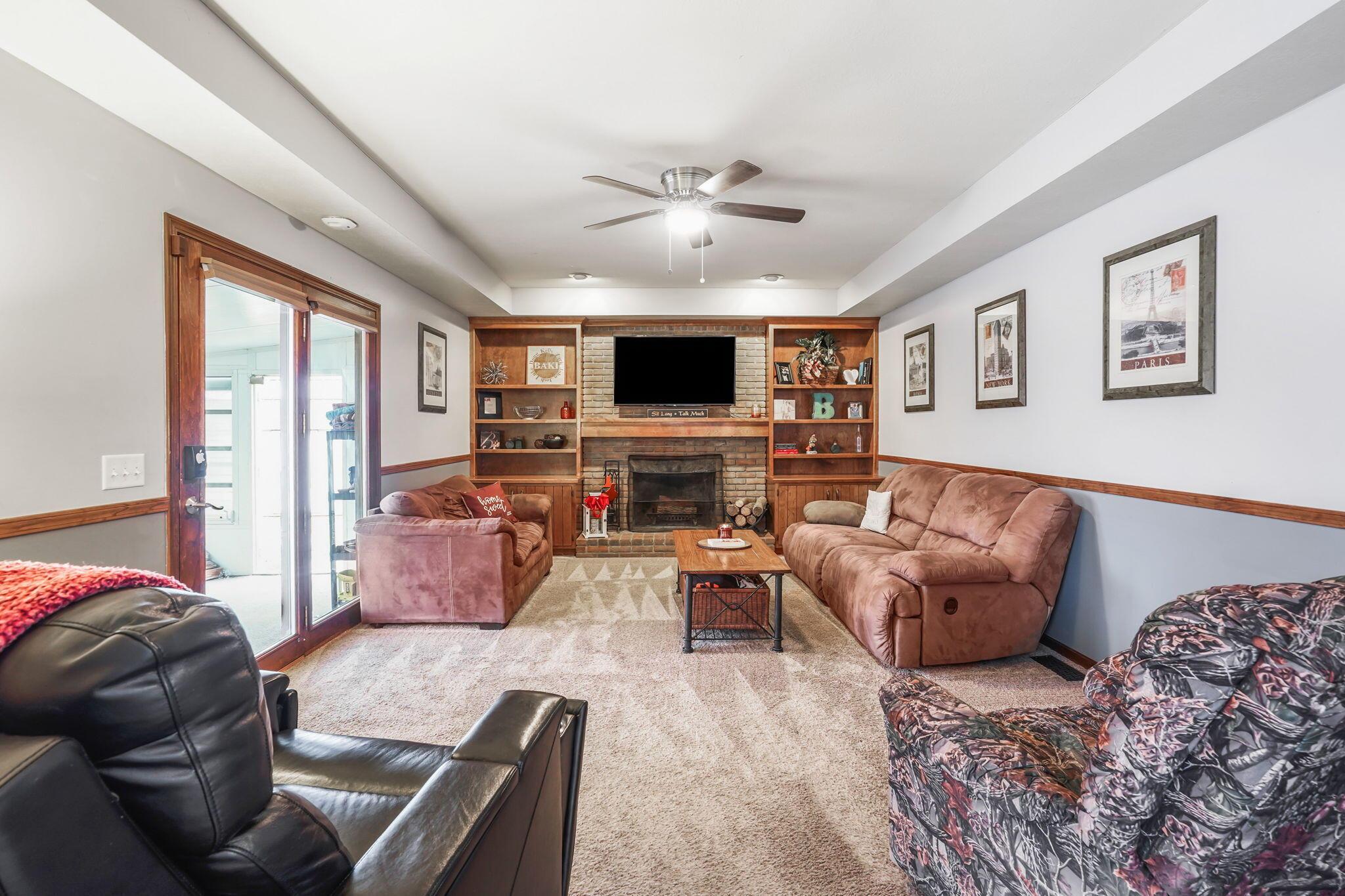 3325 Braumiller Road Delaware, OH 43015 - Photo 11 of 42 Family room with wood burning fireplace