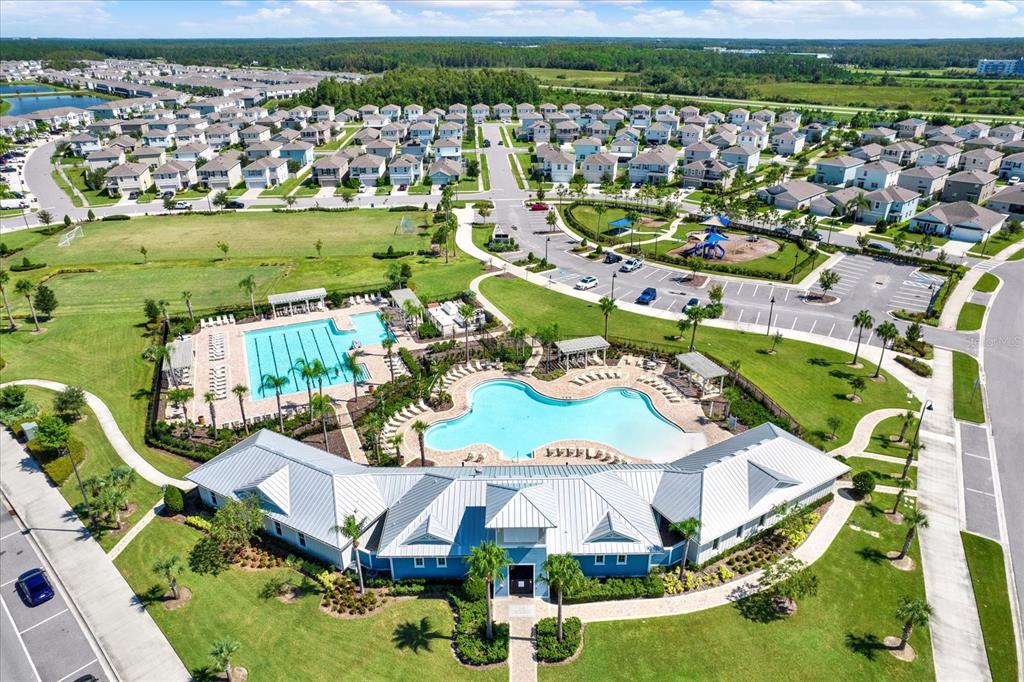 16034 Tuscany Hillside Road Odessa, FL 33556 - Photo 34 of 48 a picture of a table and chairs in the patio