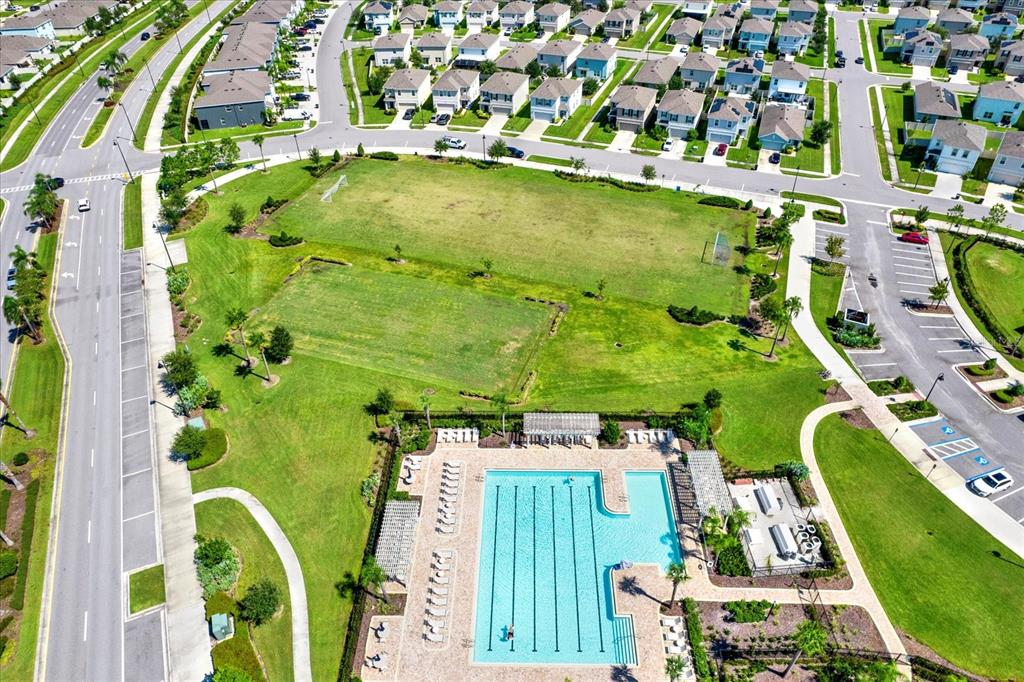 16034 Tuscany Hillside Road Odessa, FL 33556 - Photo 37 of 48 an aerial view of residential houses with outdoor space and swimming pool