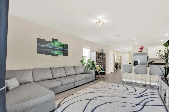 a living room with furniture and a couch