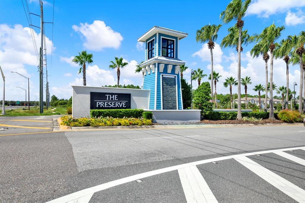 16034 Tuscany Hillside Road Odessa, FL 33556 - Photo 41 of 48 a front view of a house with a yard and garage