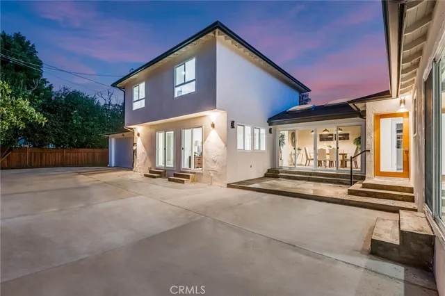 a view of a house with outdoor space and porch