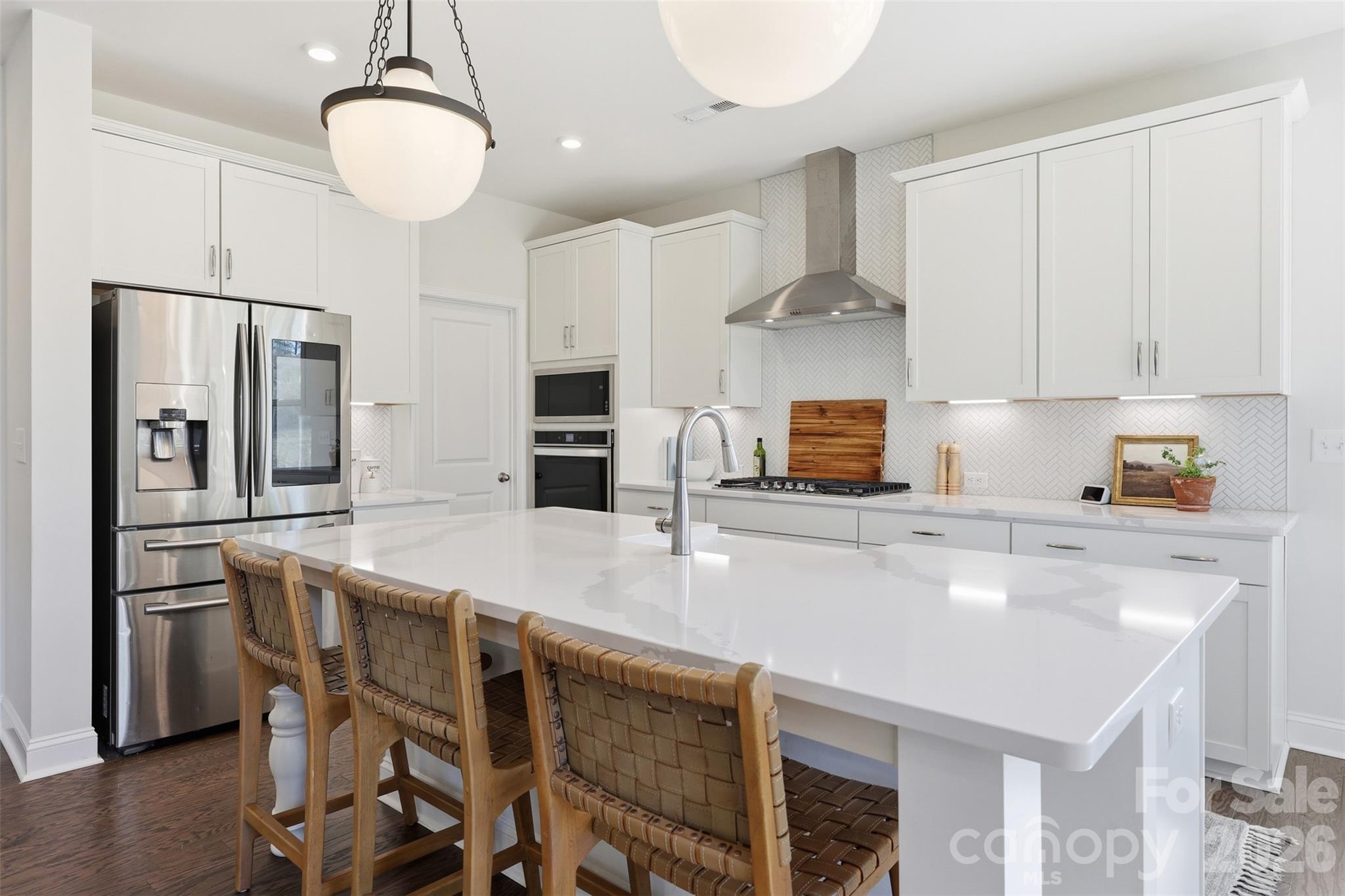 419 Clemson Tree Lane Clover, SC 29710 - Photo 12 of 48 a kitchen with stainless steel appliances a sink counter space and refrigerator