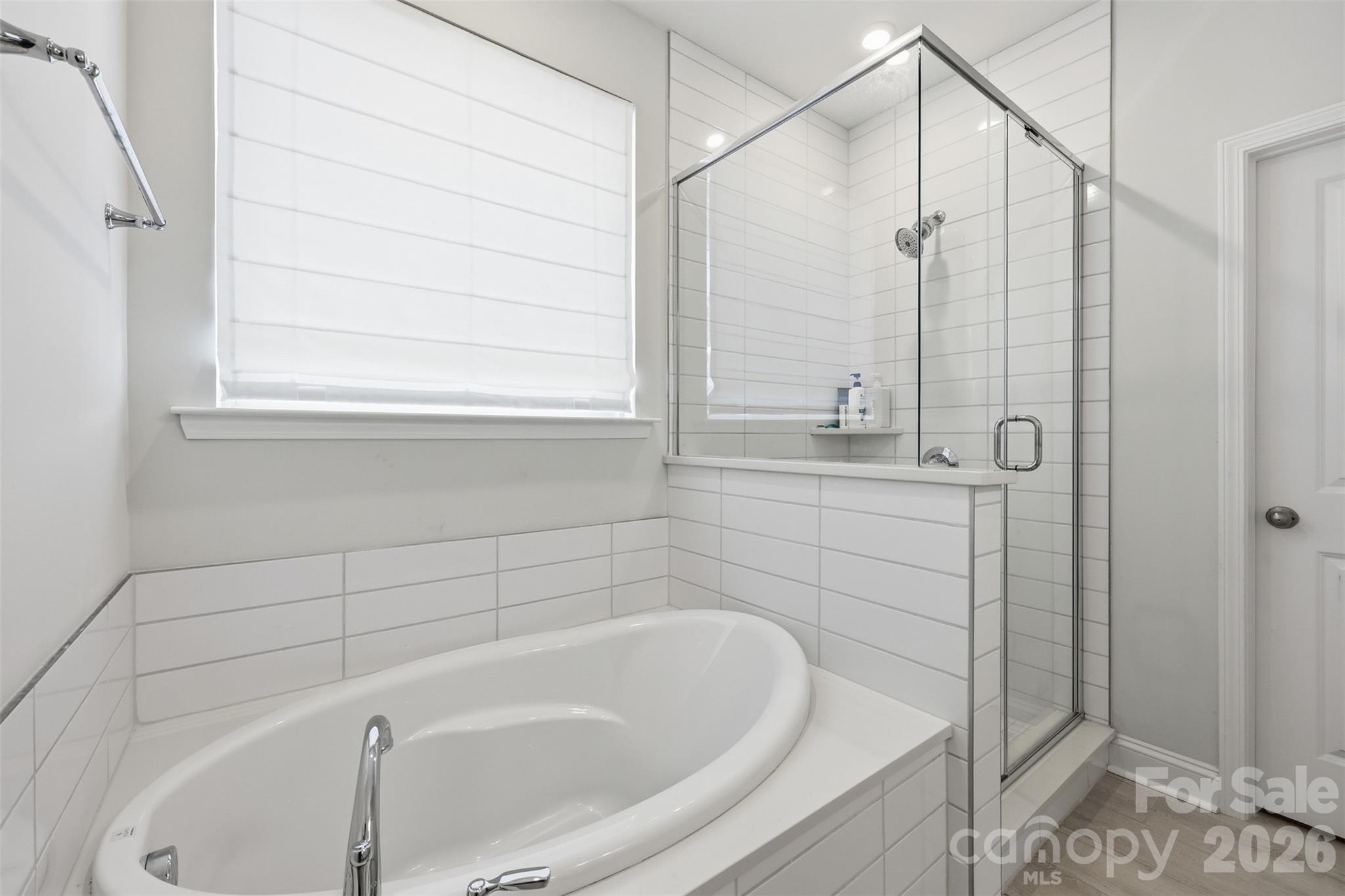 419 Clemson Tree Lane Clover, SC 29710 - Photo 24 of 48 a bathroom with a bathtub and shower