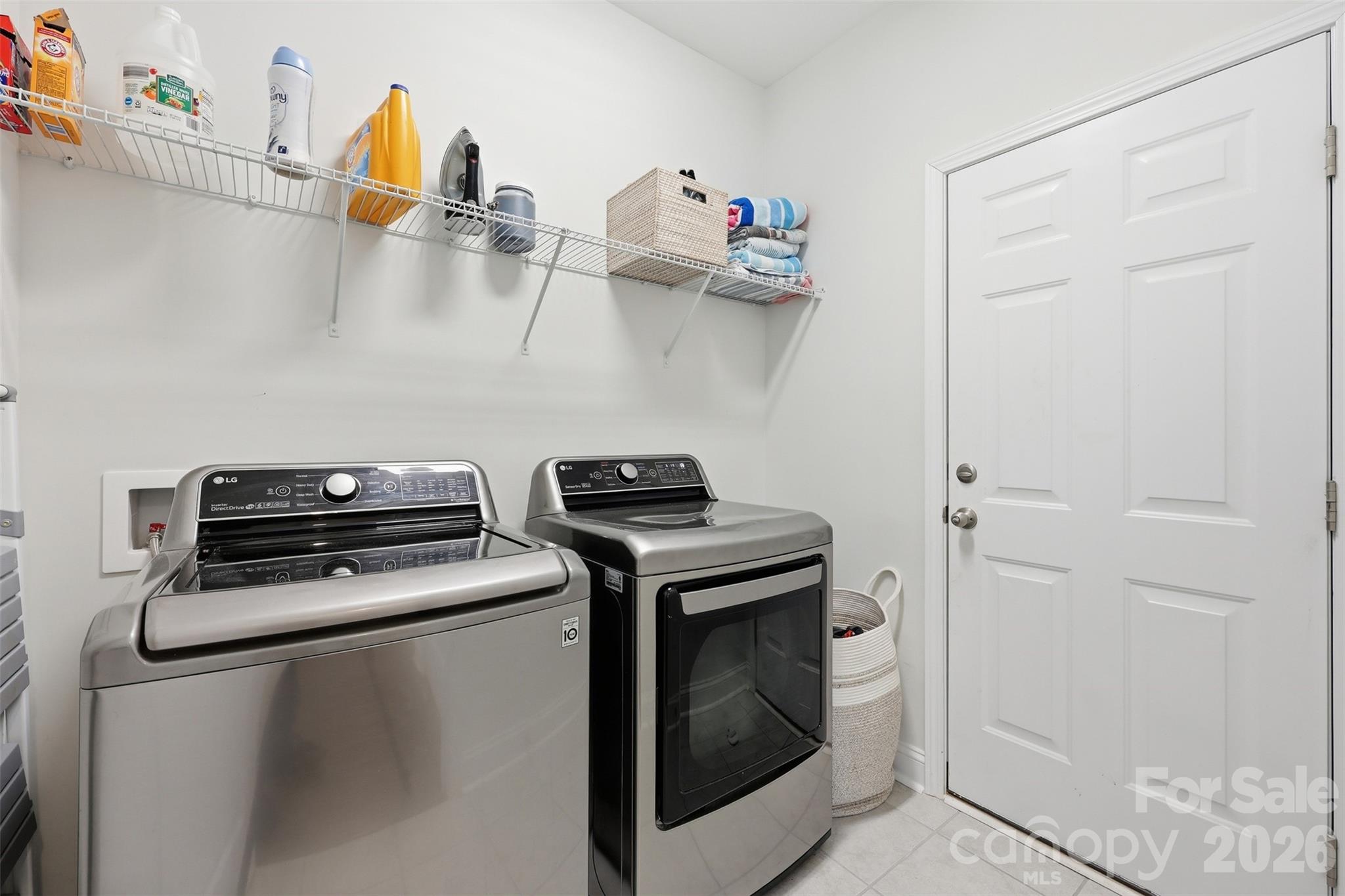 419 Clemson Tree Lane Clover, SC 29710 - Photo 26 of 48 a kitchen with a stove and a wooden floor