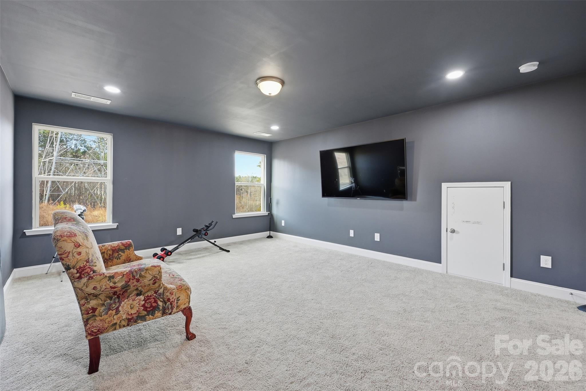 419 Clemson Tree Lane Clover, SC 29710 - Photo 28 of 48 a living room with furniture and a flat screen tv