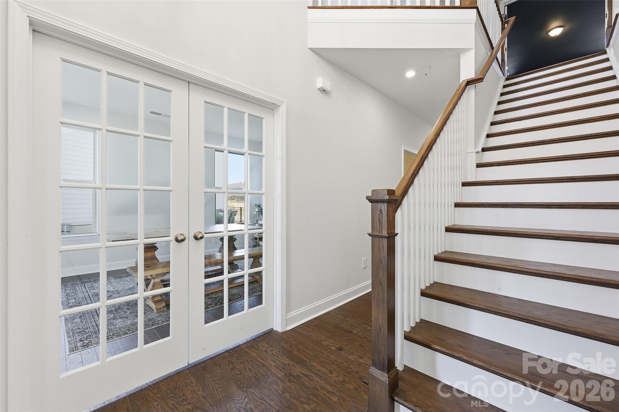 419 Clemson Tree Lane Clover, SC 29710 - Photo 3 of 48 a view of an empty room with wooden floor and windows