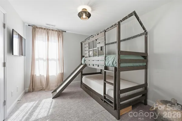 a view of staircase with a large window