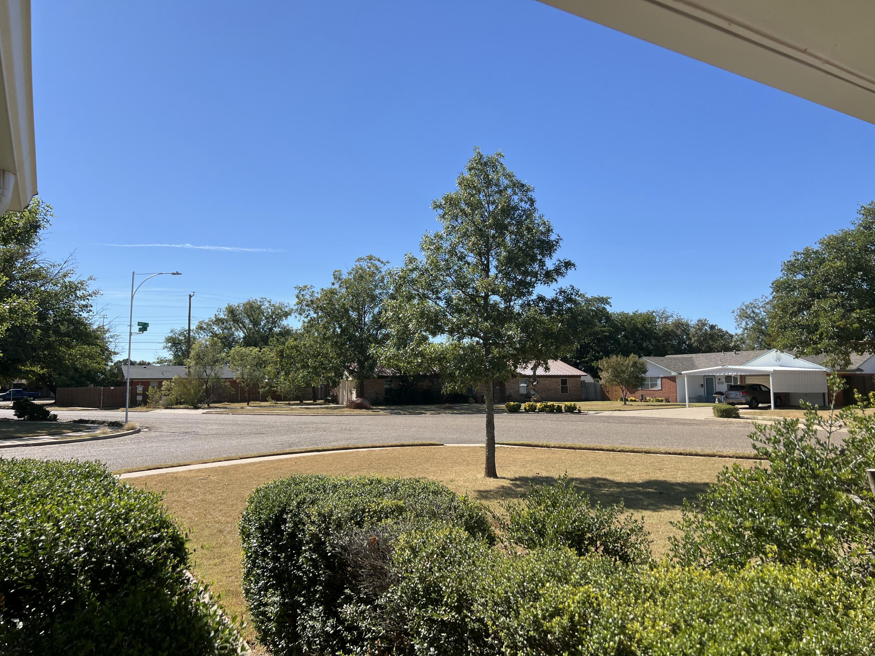 5520 36th Street Lubbock, TX 79407 - Photo 2 of 27 a view of a house with a yard