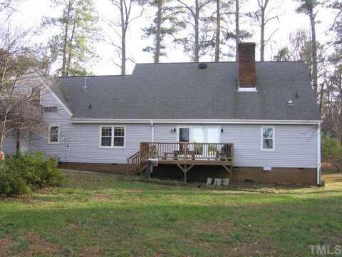 6202 Arrington Road Raleigh, NC 27607 - Photo 5 of 10 a backyard of a house with table and chairs