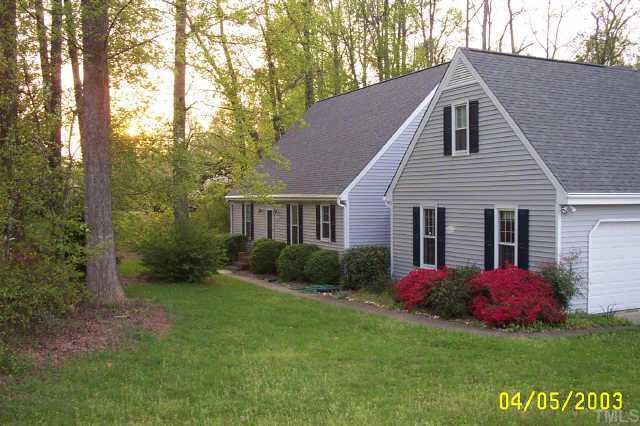6202 Arrington Road Raleigh, NC 27607 - Photo 6 of 10 a view of a house with a yard