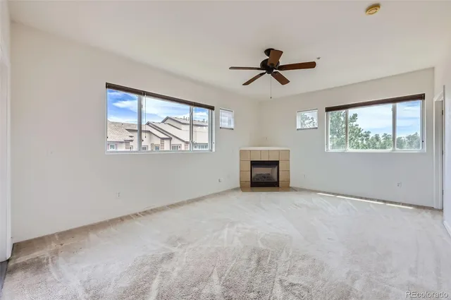 a view of empty room with windows
