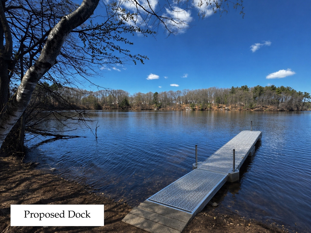 31 Arcadia Road Natick, MA 01760 - Photo 5 of 20 a view of a lake with houses