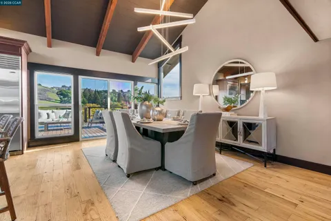 a kitchen with stainless steel appliances granite countertop a stove and a sink
