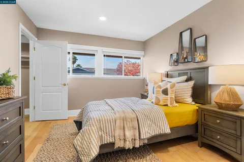 a view of a house with iron fence