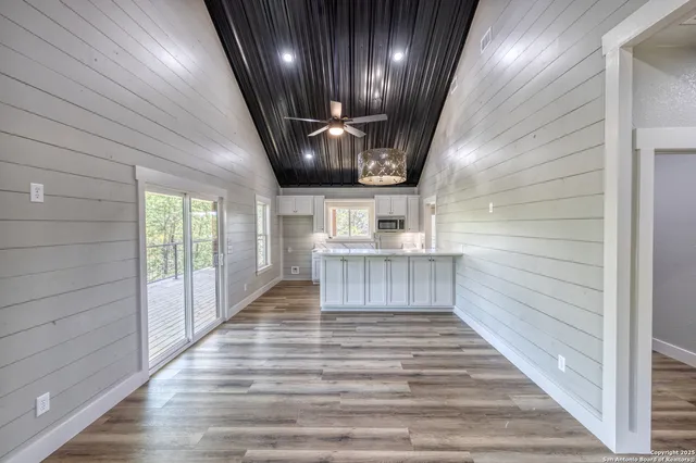 a bathroom with a sink a vanity and a mirror