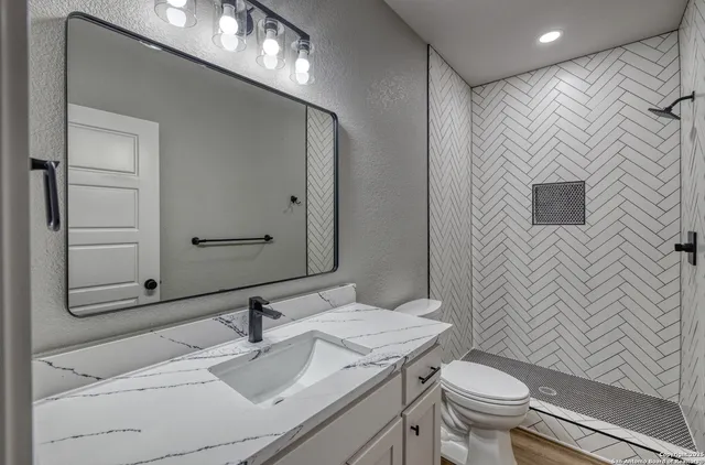 a house view with a garden space