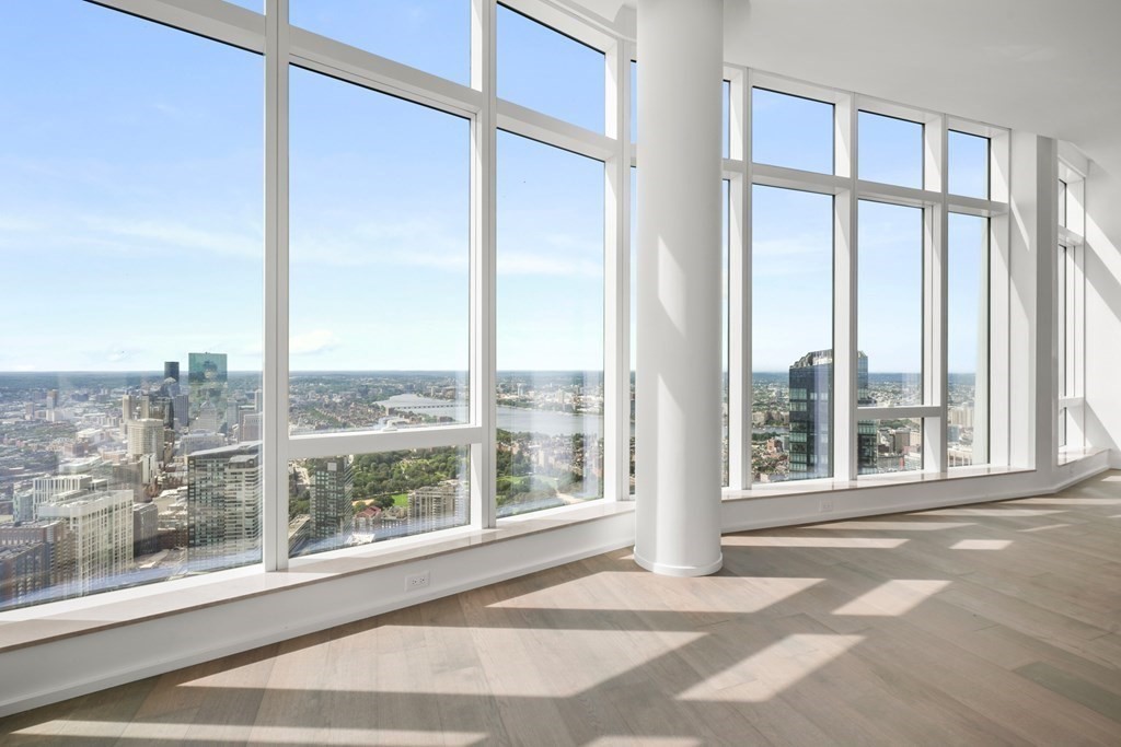 240 Devonshire Street, Unit PH 2C Boston, MA 02110 - Photo 5 of 42 a view of a glass door with a city from a window