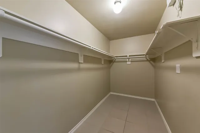 a view of an empty walk in closet